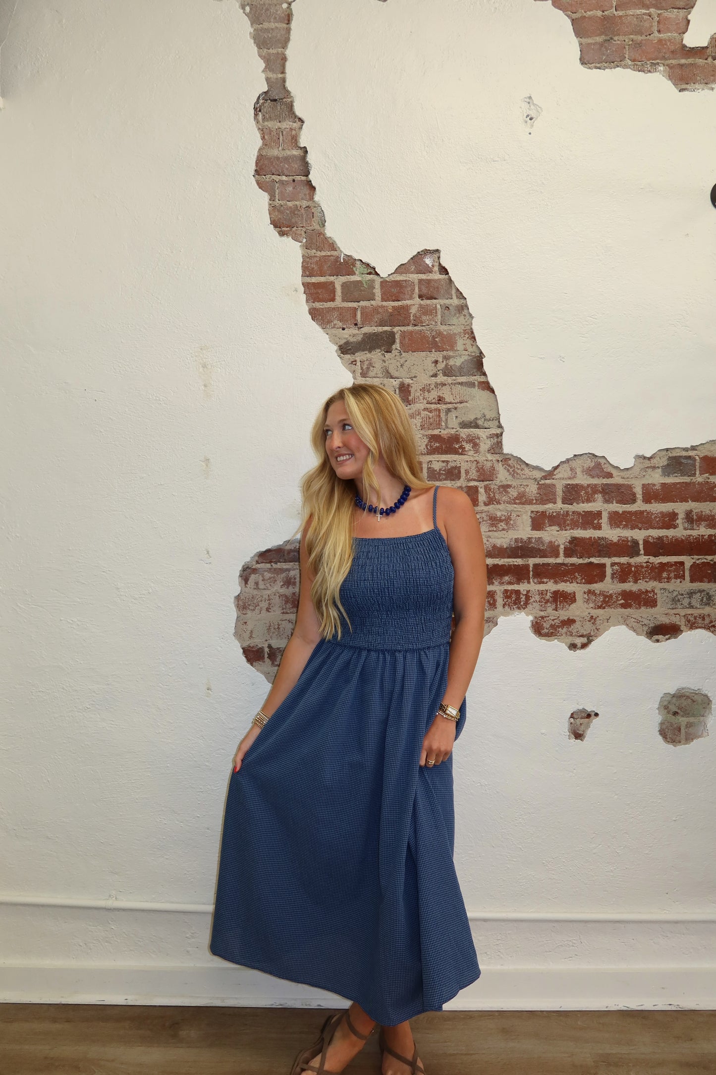 SMOCKED GINGHAM MIDI DRESS